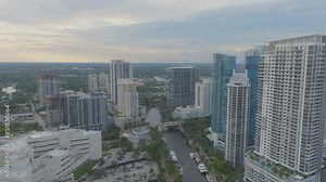 beautiful sliding drone capture of downtown fort lauderdale during the sunrise with many buildings in background