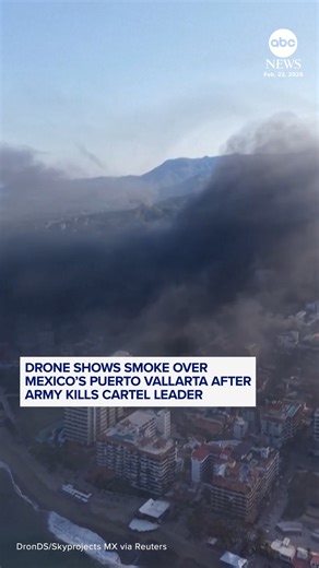 Aerial footage captured plumes of smoke blanketing the resort city of Puerto Vallarta, Mexico, as widespread violence erupted after a cartel boss was killed in a military raid. Read more: https://abcnews.visitlink.me/wGhH4N | ABC News