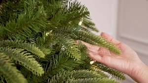 Puleo International 7.5ft Pre-Lit Slim Aspen Fir Artificial Christmas Tree with 450 Clear Lights, 1016 Realistic Dense Branch Tips, Easy Setup Artificial Trees with Sturdy Metal Stand