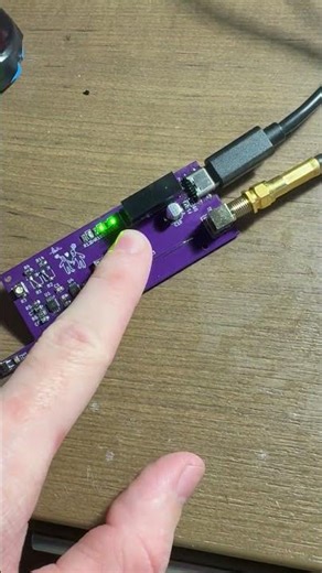 Latching circuit using D-Type Flip Flop and relay to set gain of Instrumentation Amplifier