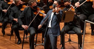 Watch what happens when a star soloist's violin string breaks while performing with Seattle Symphony