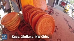 54K views · 1.3K reactions | Naan bread has a history of more than 2,000 years in northwest China's Xinjiang. How to make the staple food? | China Xinhua News | Facebook