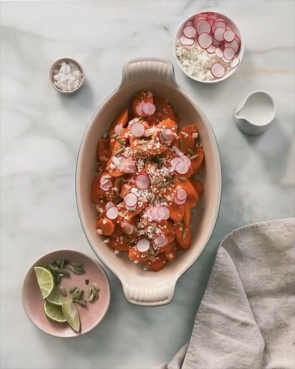 Thanksgiving planning is in effect! This chipotle-braised carrots side dish is SO tasty and was prepared in just 10 minutes! Topped with all the garnishes: onion, radishes, radishes, cilantro, lime crema, pepitas and cotija. Recipe is in the comments below! #Thanksgiving #thanksgivingdinner #thanksgivingfood #recipe #recipeideas #recipesharing #deliciousfood | A Cozy Kitchen