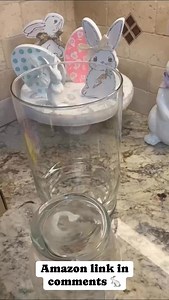 "How cute is this Easter DIY? 🐰🌸 The 'Peeps' are actually sponges, and they make the perfect festive vase filler! Paired with these gorgeous tulips, it’s an easy and fun way to add a touch of spring to your home. You can grab both the sponges and tulips from my Amazon store! 🌷💛💜💖 #EasterDecor #DIYDecor #SpringVibes #Peeps #TulipLove #AmazonFinds #EasterDIY #FestiveHomeDecor" | Crafting By The Bay