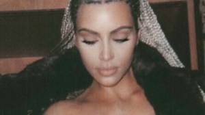Khloe Kardashian under fire for posting totally topless photo of sister Kim