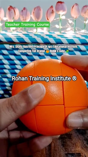 Principal Shafia Nasreen CONQUERS Orange Cube! 🍊🧩✨ | Rohan Training Institute ® Educator triumph! Mrs. Shafia Nasreen, Principal of Iqra Educational Institute, masters complete Orange-shaped Rubik's Cube through Teacher Training Course—perfect first layer, F2L, yellow cross, OLL, PLL despite fruit distortion. Rohan Training Institute: Professional Rubik's training for educators worldwide. Empowering teachers to inspire student genius! #RubiksCube #OrangeCube #TeacherTraining #IqraEducationalIn