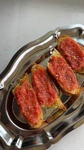 Pan con tomate is my fave tapas dish 🍅 and it is SO easy to make. Coarsley grate fresh ripe tomatoes, mix with a generous drizzle of decent olive oil (I used first harvest @its.olio ) and salt flakes (I used @_cornishseasalt). Pan fry some good quality bread in oil til crispy, rub it with garlic and then top with the tomato mixture. #snack #tomatoes | Coconut and Bliss