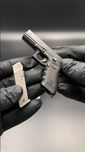 The world's smallest Glock firing #miniature #handmadegun #minicrossbow #smallgun