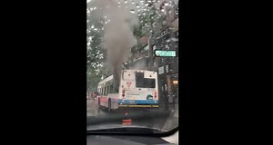 The bus caught fire around 7:45 a.m. Tuesday.