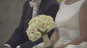 Bride and groom sitting together at their wedding - Free Stock Video
