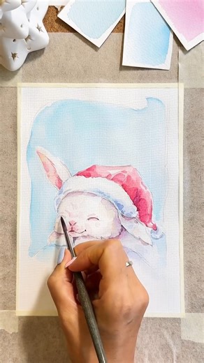 Artsy Emi ♡ on Instagram: "Save how to draw the Christmas Bunny 🎄 • • • . . . . . . . . . . . . DM for credit or remove #watercolor #акварель #painting #sketch_daily #illustration #иллюстрация #иллюстрацияназаказ #waterblog #мастерклассыдлядетей #бесплатныймк #рисунокназаказ #рисуюкаждыйдень #watercolorlove #пионыакварелью #inspiration #postcards #урокирисования #speedpainting #bunny #марафон #открытки #christmascard"