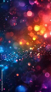 A colorful image of a galaxy with many small dots. The dots are of different colors and sizes, creating a sense of depth and movement. The image conveys a feeling of wonder