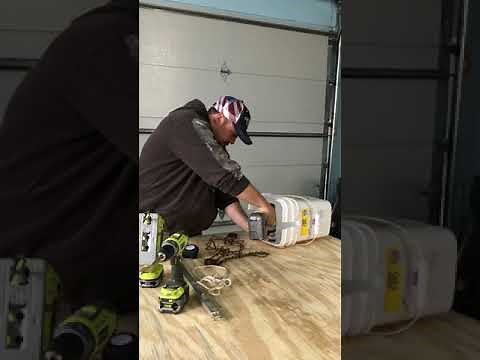 Nuisance raccoon trapping bucket set Conibear