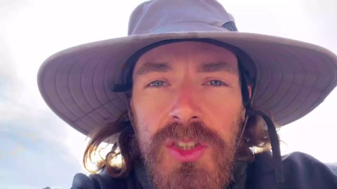 Digging a swale for pond drainage