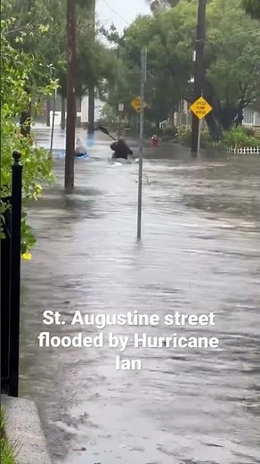 Boaters making due on a street flooded by Hurricane Ian Wednesday in St. Augustine, FL.