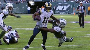 Tavon Austin stiff arms defender, fights for 21-yard gain