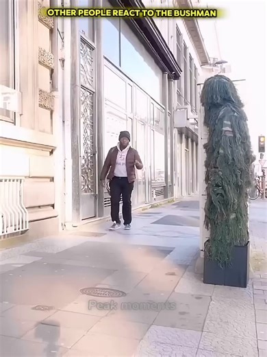 People getting scared by bush Man → one person NOT scared 👑