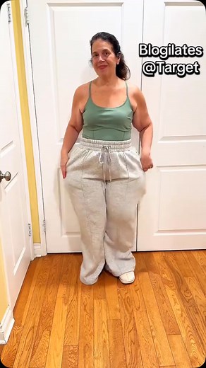 So happy we can access affordable pieces from Blogilates at Target now! These wide legs Travel sweatpants are so thick, roomy, warm and comfy. The drawstring waistband, deep slash pockets and pintuck detail on the front and back are wins for practicality and style. Love the long line of this corset crop bralette and this hedge green color. Wearing 1X for reference #blogilates #athleisurewear #athleisure #casualstyle #comfystyle #creatorsearchinsights @cassey @target Comment SHOP below to receive