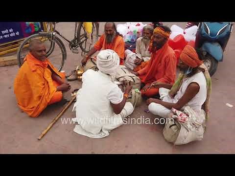 Sadhu chillum party: Sadhus or Hindu ascetics camp and smoke chillum at Haridwar Kumbh Mela 2021