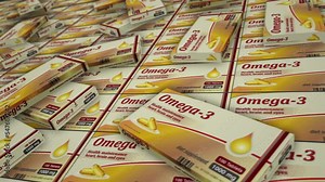 Omega 3 oil tablets box production line. Healthy nutrition and diet supplement pills pack factory. Abstract concept 3d rendering loopable seamless animation. Stock Video