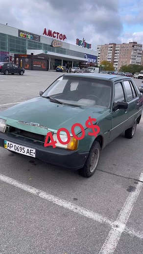 Damaged Green Car for Sale: Great Price at $400