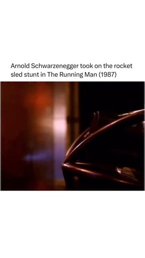 Historic Moments on Instagram: "Arnold Schwarzenegger behind the scenes of The Running Man in 1987, taking a ride on the rocket sled used in the film’s opening sequence. No CGI, no digital tricks — just practical effects and Arnold strapped into a high-speed stunt setup that set the tone for the movie’s intense, futuristic action. A classic example of how 80s sci-fi relied on real machinery and real danger to make everything feel larger than life. 🚀"