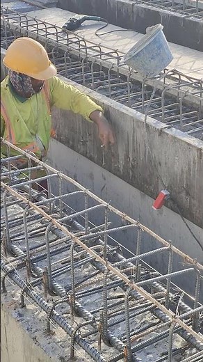 Put tie wire and nails into concrete beam to install side formwork