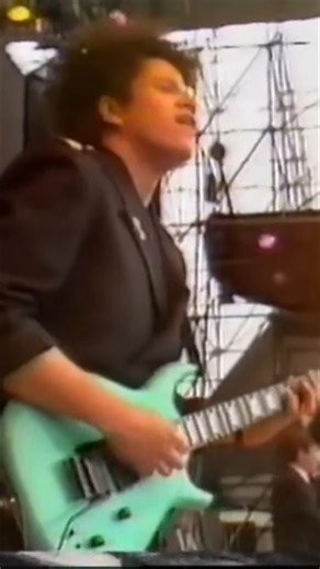 Robert Palmer’s signature hit “Addicted to Love” took on a fresh groove when UB40 joined him live at St. Andrew’s Stadium in Birmingham on June 10, 1989. Their collaboration blended Palmer’s powerhouse vocals with UB40’s reggae-infused sound, creating one of the standout moments of the concert. The energy of the crowd and the chemistry onstage made this performance a highlight in both Palmer’s career and UB40’s long history of collaborations. Like and subscribe for more classic live performances