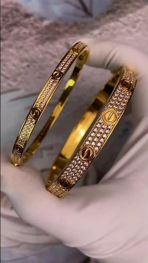 18k yellow gold cartier love paved bracelet small model vs regular model.