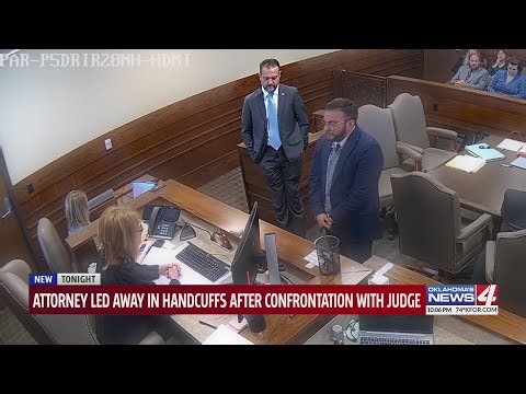 Attorney led away in handcuffs after confrontation with judge
