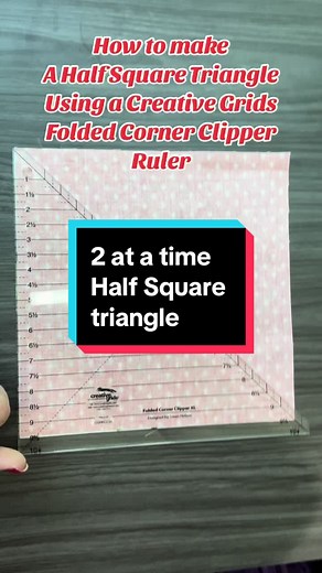 How to use the @Creative Grids® USA Folded Corner Clipper Ruler to make a 2 at a time Half Square Triangle. Also showing the Viking Sewing Machine with the lock stitch. #quiltingtiktok #quiltshoptalk #quiltersoftiktok #sewingmachines #halfsquaretriangles #sewingtools #sewingnotions