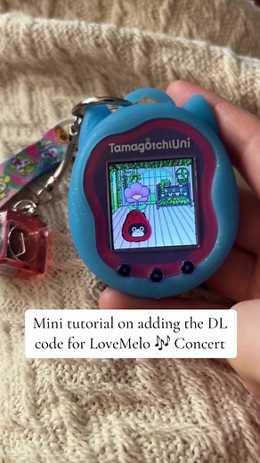 Here’s a mini tutorial on adding the DL code for LoveMelo🎶 Concert✨ #tamagotchiuni #tamagotchi #tamagotchis #tamaverse #tamagotchiveryberryland #veryberrylandtamagotchi #tamagotchicase #tamagotchifaceplates #tamagotchicase #tamagotchicollector #tamagotchicollection #lovemeloconcert #lovemeloconcerttamagotchi