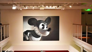 Gottfried Helnwein's Mouse 1 is currently overlooking our upcoming exhibition, Mickey Mouse: From Walt to the World. It took a team of six to get this artwork up on the wall. See it for yourself starting May 16. Gottfried Helnwein, Mouse 1, 1995; Courtesy of the San Francisco Museum of Modern Art | The Walt Disney Family Museum