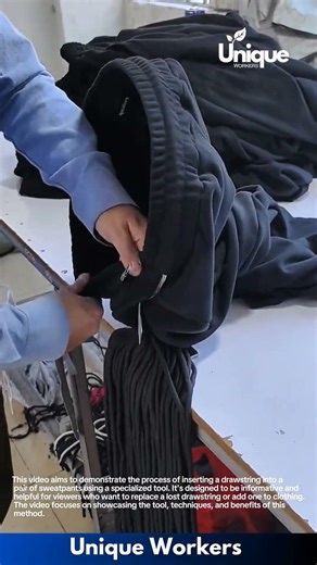 Trousers Elastic Insertion Process: Factory Worker Fits Elastic Cord into Winter Jacket