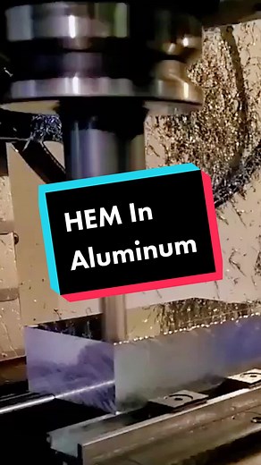 Making chips fly with this aluminum end mill! #tiktokmachinist #cnc #machining #chips #foryoupage #machinist #fyp #satisfying