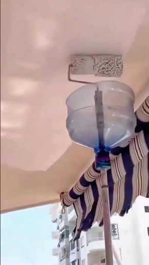 How to Paint Ceilings Without Mess Using a DIY Roller Shield