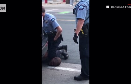 Video shows Minneapolis officer kneeling on black man's neck