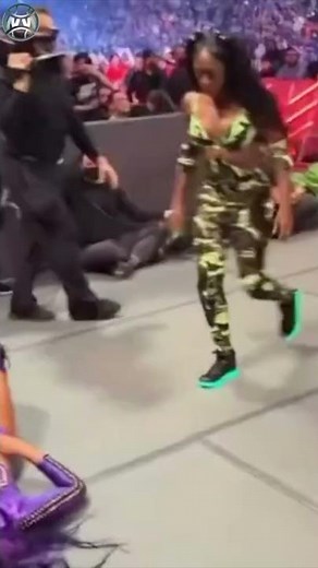 Naomi stops to check on Cameron during the Royal Rumble