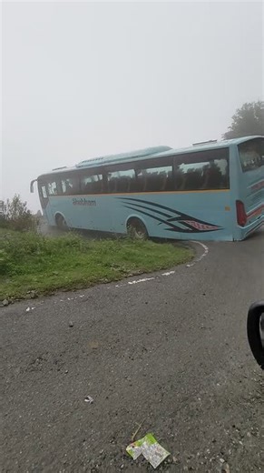Bus Scrapes Side While Navigating Sharp Turn
