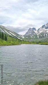 Courmayeur, Aosta Valley, Italy - Mont Blanc Massif. Combal lake and plateau, between Italy and France. In the background: Pyramides Calcaires.