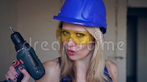 Excited Woman Builder. Beautiful Woman Construction Worker with a Tool Stock Footage - Video of smile, work: 176742796