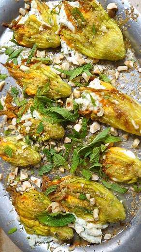 The Venetian Pantry on Instagram: "Stuffed Baked Courgette Flowers with Ricotta, Mint and Hazelnut . Today we’re making an Italian summer classic: stuffed courgette flowers (or zucchini blossoms — though in Italian we confusingly call them pumpkin flowers). These blossoms are as delicate as they are versatile. In Italy, they’re usually made one of three ways: tossed through pasta, deep fried in batter, or — as in this case — stuffed and roasted. (You can, of course, stuff and fry them too, but I