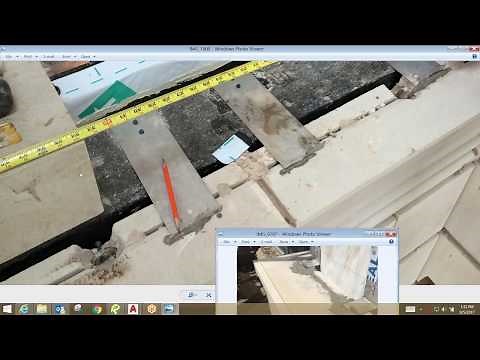 Kerf Slot with Strap Anchors: Technique for Installing cast stone, GFRC, precast stone panels