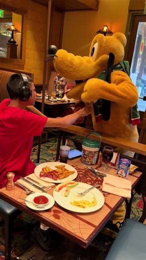 Pluto Joins Thomas at Mickey's Holiday Pajama Party
