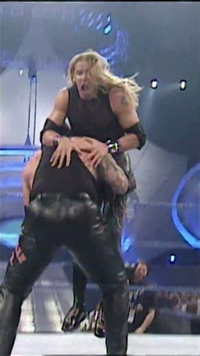 Undertaker obliterates Edge and Christian after receiving a tag from Kane