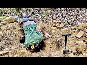 Digging down over two feet in the ground and finding old stuff buried metal detecting artifacts