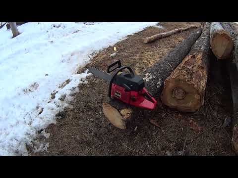 "Saw of the day" Jonsered 670 super bucking firewood on the log pile