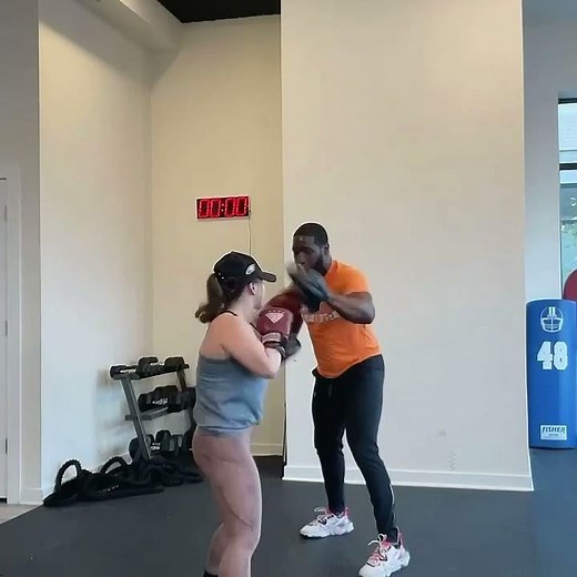 Women’s boxing training. Pad work drills