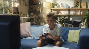 Kids Playing Video Games Stock Footage: Royalty-Free Video Clips - Storyblocks