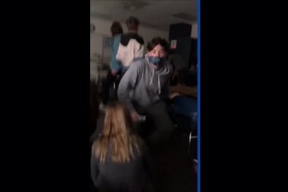 Terrified Michigan students seen on viral video jumping out a classroom window amid fears the gunman was impersonating a cop